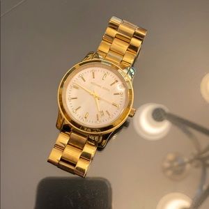 Michael Kors women’s gold watch